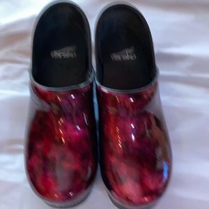 Ladies EU size 38 Dansko patent leather clogs never worn.